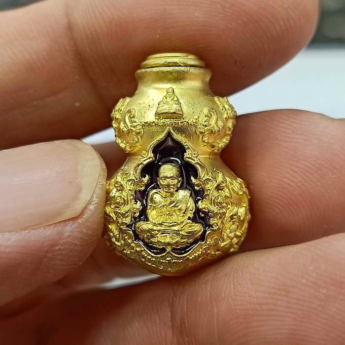 2-659 วัดใจ 50 น้ำเต้ามหาโภคทรัพย์ ไอ้ไข่กายสิทธิ์ วัดเสมาเมือง จ.นครศรีธรรมราช ปี 2563 ทองทิพย์ลงยา หมายเลข 216 กล่องเดิม