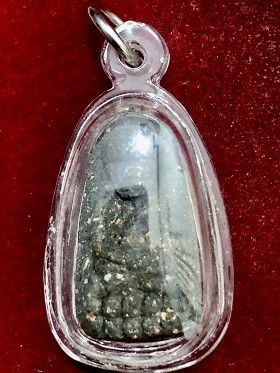 หลวงพ่อทวดเตารีดเนื้อว่าน  ในกรอบเลี่ยมพลาสติก