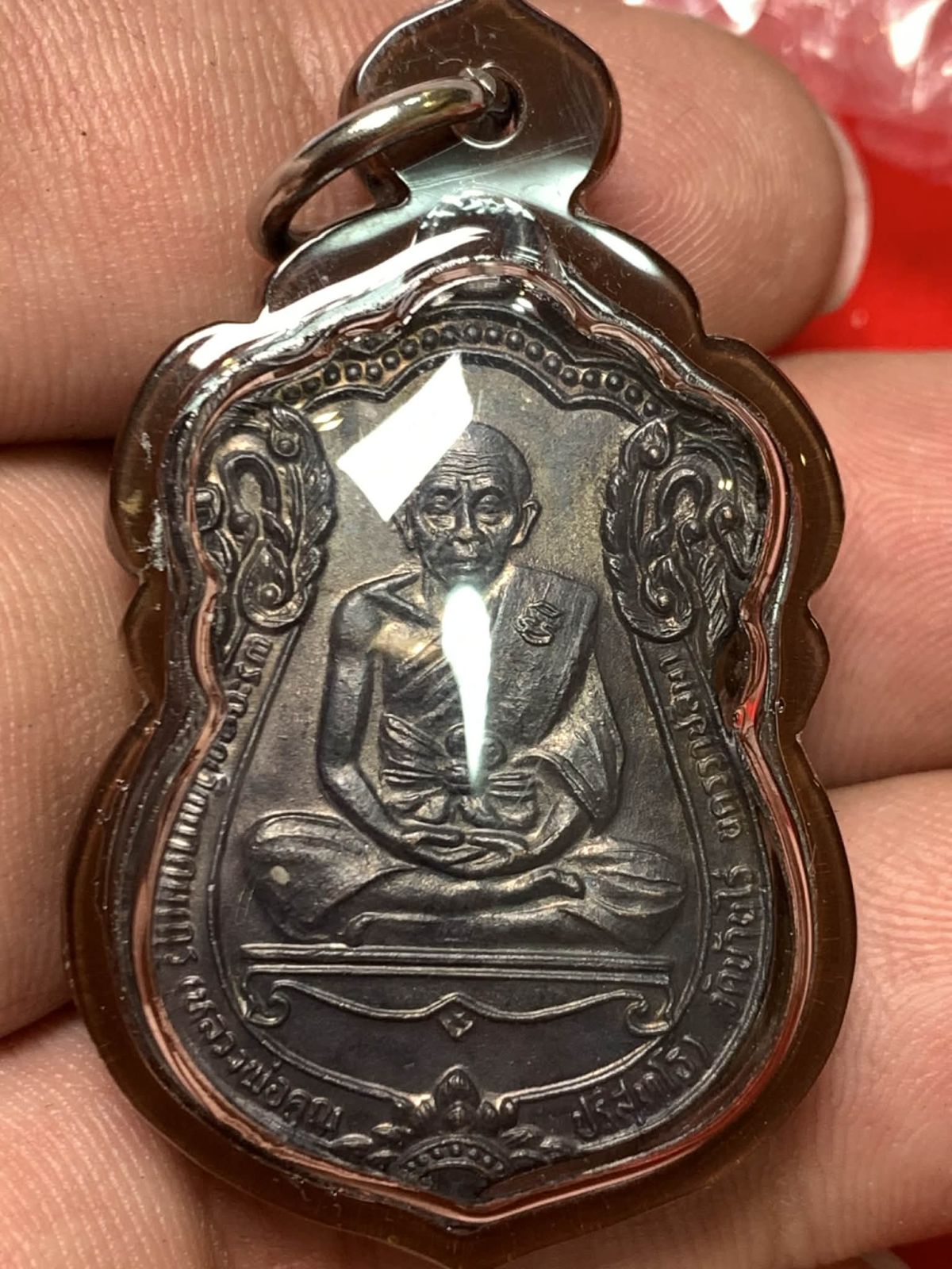 พัดยศหลวงพ่อคูณปี 35 เนื้อทองแดงรมดำ