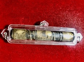 ตะกรุดทองแดงเชือกถัก(หนัก) ยาว4นิ้ว  ไม่ทราบที่