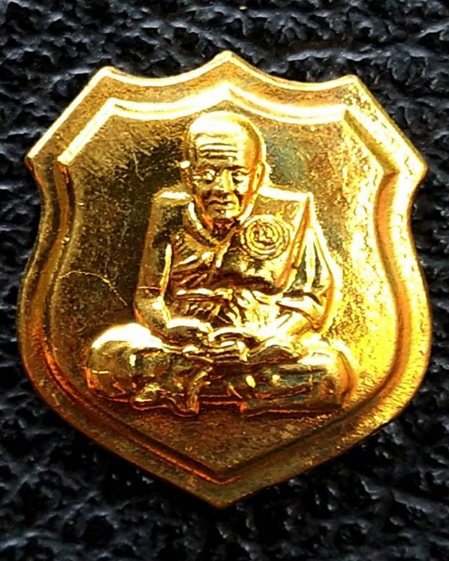 7.เหรียญอาร์ม หลวงปู่ทวด วัดช้างให้ เนื้อฝาบาตร ขนาดสูงประมาณ 2 ซ.ม.