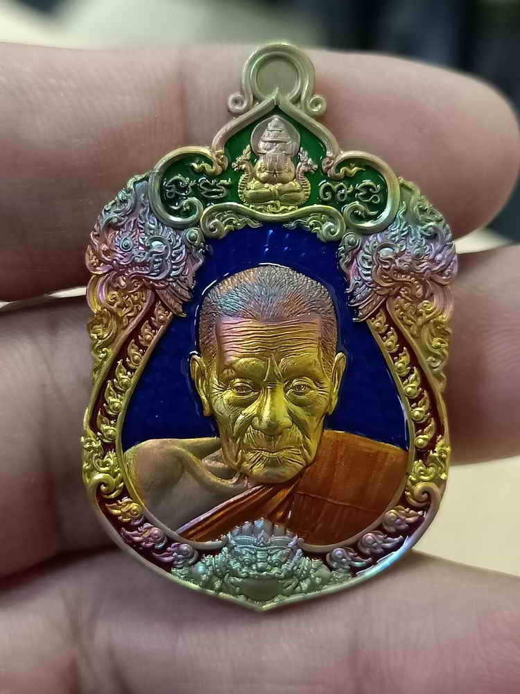 2-694 วัดใจ 100 เหรียญเสมามหาอุตม์ หลวงปู่อิ่ม วัดทุ่งนาใหม่ จ.นครศรีธรรมราช ปี 2567 เนื้อทองทิพย์ ลงยาซุ้ม ขอบ จีวร หมายเลข 27 กล่องเดิม