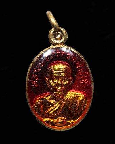 400.-เม็ดแตงหลวงปู่ทวดกะไหล่ทองลงยาแดง ปี22 พร้อมซอง