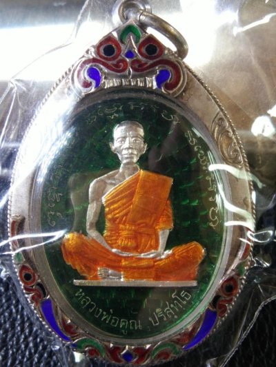 3500.- เหรียญรูปไข่ที่ระฤก เลื่่อนสมณศักดิ์ 47 เนื้อเงินลงยาสีเขียว แยกชุดกรรมการ no.87 เลี่ยมเงินลงยา