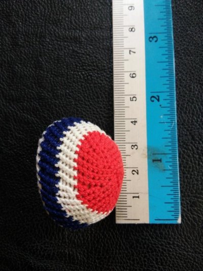 600.-เบี้ยแก้ ถักลายธงชาติ