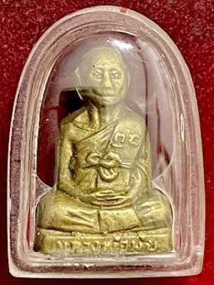 รูปหล่อหลวงพ่อมุ่ย รุ่น๒ หลังหนังสือแถวเดียว เนื้อทองเหลือง  วัดดอนไร่  จ.สุพรรณบุรี  พ.ศ. ๒๕๐๓  เลี่ยมพลาสติกหนา