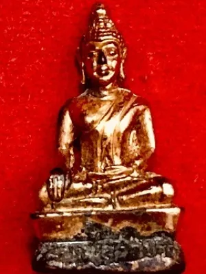 พระพุทธฐานอุดกริ่ง สูง3ซม.  ไม่ทราบที่