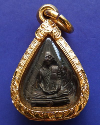 รูปเหมือนใบโพธิ์ หลวงปู่โต๊ะ วัดประดู่ฉิมพลี เนื้อนวะ พ.ศ. 2523 ตลับทองกันน้ำ